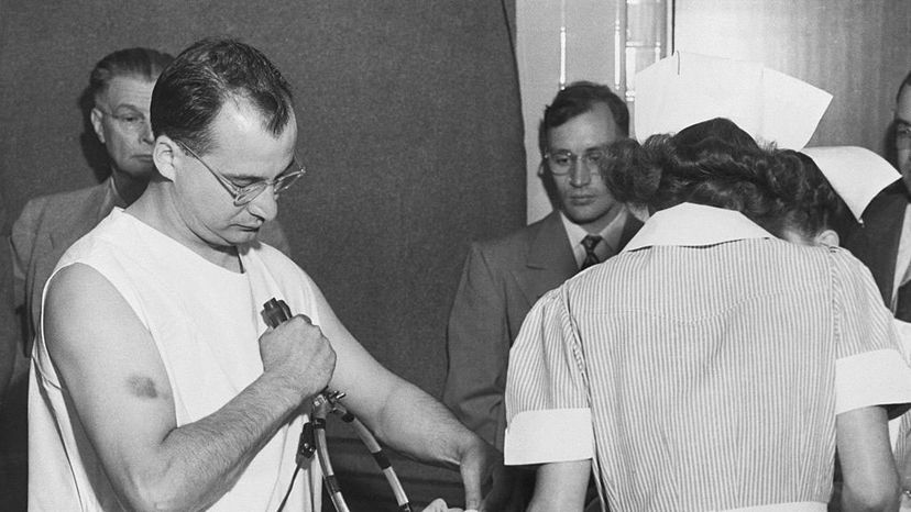 Dr. James G. Shanklin, a hospital psychiatrist, administers electric shock and anesthesia to a patient in 1949. The DSM was originally developed to catalog psychiatric disorders at a time when mentally ill people received poor or no treatment. Bettman/Getty Images