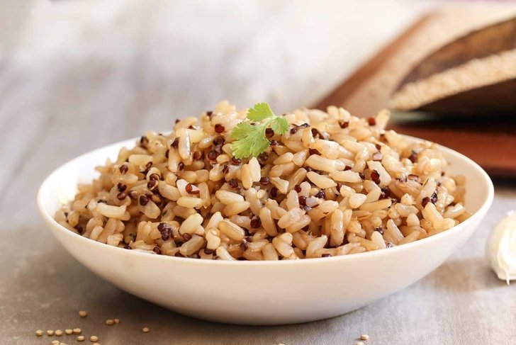 Close up of Red Quinoa brown rice served in a bowl, selective focus